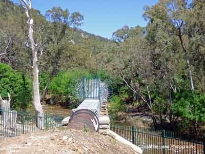 River Torrens, flowing under the Gorge Weir Aqueduct, Gorge Rd., Athelstone,
 SA.